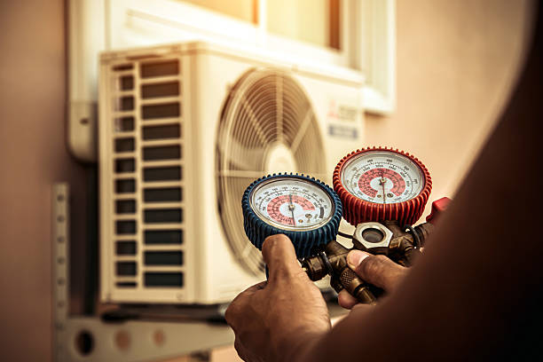Professional Heat Pump Repair technician working in Satsuma, FL